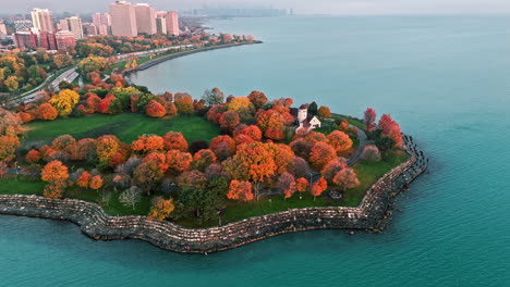 Aerial-tracking-shot-of-fall-foliage-at-the-Promontory-Point-of-Chicago,-USA