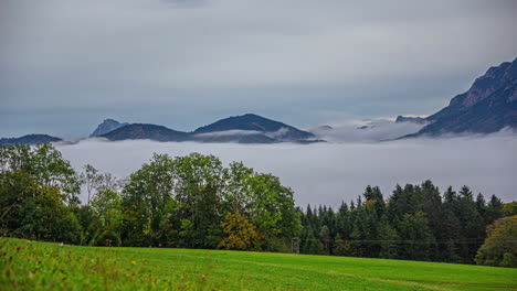 The-wavy-movements-of-low-hanging-clouds-in-a-green-alpine-valley