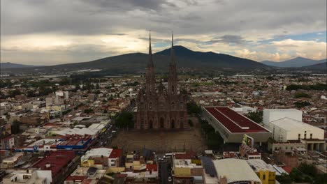 DRONE-HYPERLAPSE-OF-ZAMORA-MICHOACAN-CATHEDRAL-AT-A-CLOUDY-DAY