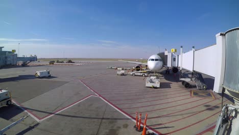 fast-motion-view-of-a-plane-unloading-at-Saskatoon-airport,-Canada