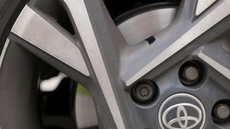 Dirty-car-wheel-with-brake-dust