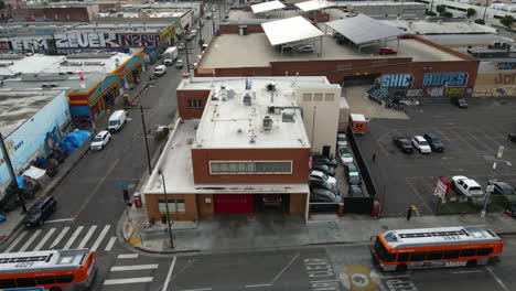 Aerial-view-in-front-of-the-LAFD-Fire-Station-9,-in-Skid-Row,-Los-Angeles,-USA