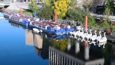 Reflection-of-the-canal-boats-in-Stratford,-London,-United-Kingdom