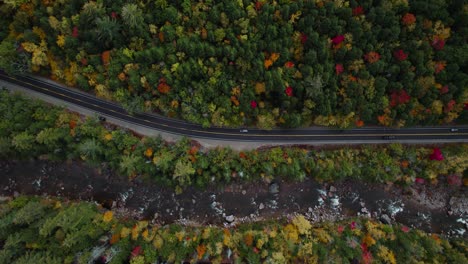 Kancamagus-Highway-Road-with-Fall-Forest-Foliage-in-New-Hampshire,-Top-Down-Aerial