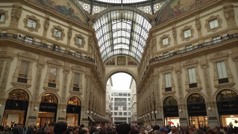 Louis-Vuitton-and-Prada-Shops-in-Galleria-Vittorio-Emanuele-II-with-People-Walking-Around