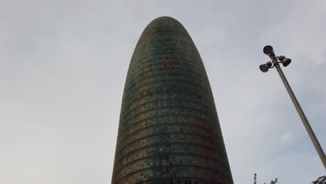 Closeup-Shot-of-Agbar,-Glories-Tower-Barcelona-Spain-Cucumber-Architectural-Building