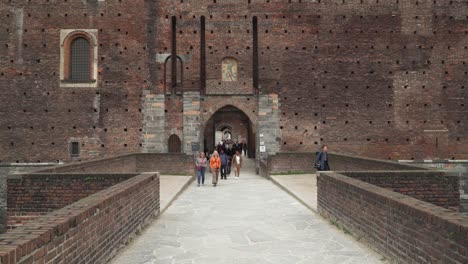 Crowd-of-People-Walks-Out-of-Sforzesco-Castle