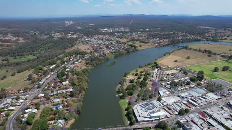 Aerial-Of-Macleay-River-With-View-Of-Two-Steel-Truss-Bridges-Spanning-In-New-South-Wales,-Australia