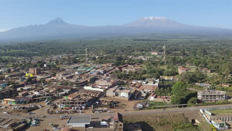 Peaceful-African-town-Loitokitok-at-footstep-of-Mount-Kilimanjaro,-Kenya,-aerial-view