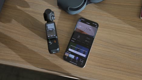 Smartphone-Being-Connected-To-DJI-Osmo-Pocket-3-Whilst-On-Table