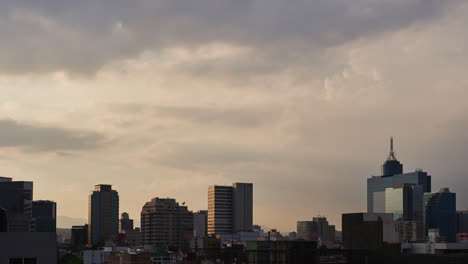 Clouds-above-skyscrapers-and-World-Trade-Center-in-Mexico-City,-sunset-timelapse