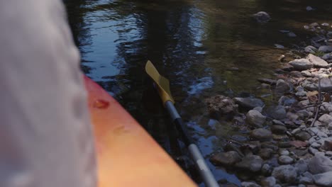 Kayak-And-Paddle-By-The-River