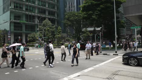 Locals-Crossing-Road-At-Cross-Street-In-Downtown-Singapore