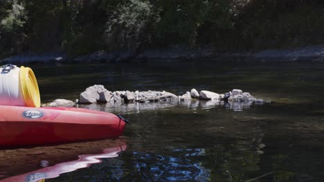 Plastic-Container-Drum-On-Kayak-In-The-River