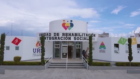 A-magnificent-drone-view-showcases-a-beautiful-and-colorful-rehabilitation-center,-Ecatepec-de-Morelos,-Mexico