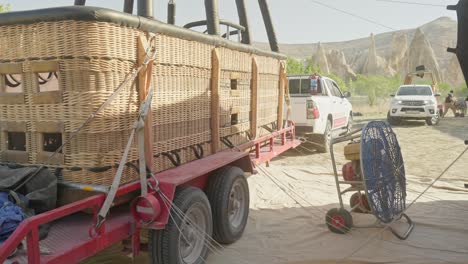 Hot-air-balloon-passenger-wickerwork-basket-on-two-axle-trailer