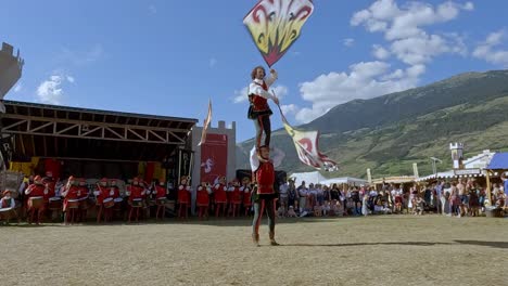 Contrada-della-Corte,-Association-of-flag-wavers-and-musicians-during-one-of-their-performances-at-the-South-Tyrolean-Medieval-Games