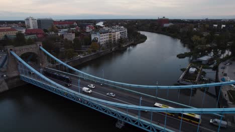 Vehicles-transportation-over-Grunwald-bridge-in-Wroclaw-at-sunset