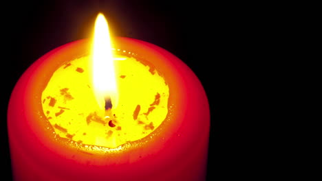 Red-candle-burning-timelapse-With-copyspace-for-text