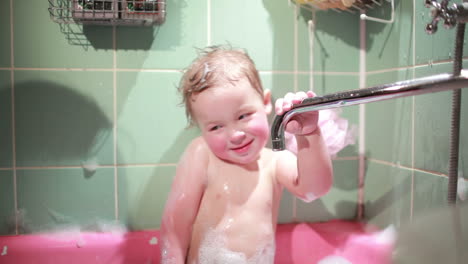 Two-year-old-boy-plays-in-the-bath-Slow-motion