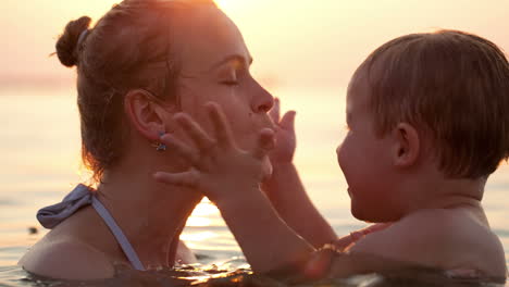 Mother-kissing-her-young-child