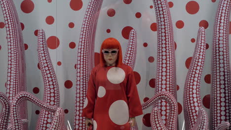 Installation-with-wax-model-of-Japanese-artist-Yayoi-Kusama