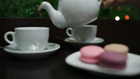 Tea-with-macaroons-in-cafe