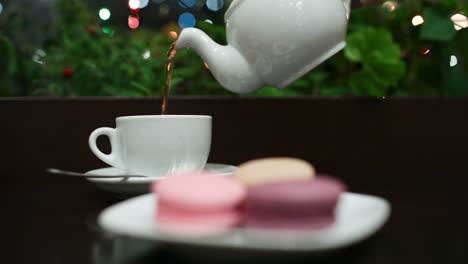 Tea-with-macaroons-in-cafe