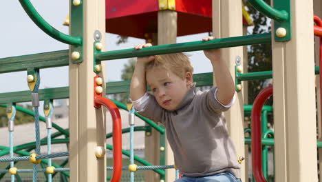 Boy-on-playground-equipment