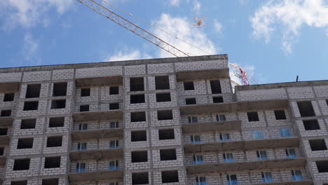 Man-flying-copter-on-the-construction-site