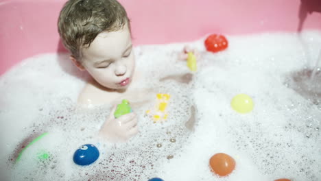 Boy-playing-in-the-bath