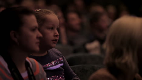 Bored-girl-in-the-auditorium