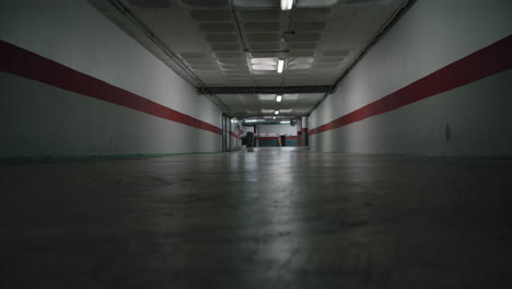 Empty-underground-driveway-with-dim-flickering-light