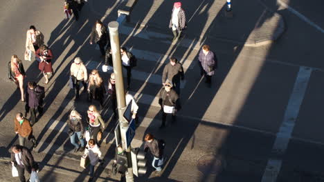 People-walking-across-the-road-on-zebra