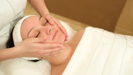 Facial-treatment-with-professional-massage-of-cosmetician