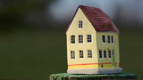 Putting-a-toy-house-on-small-stub
