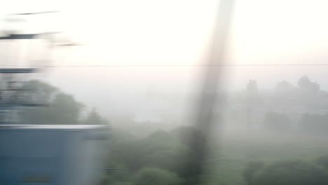 Passing-by-a-village-in-fog