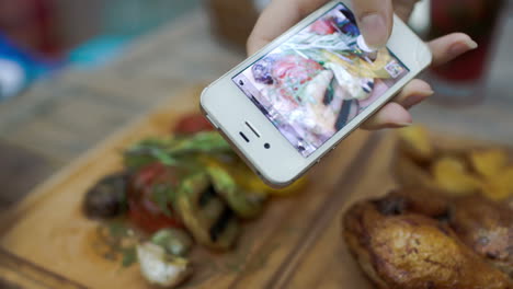 Taking-picture-of-dish-served-in-cafe