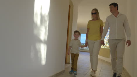 Young-Family-Walking-over-the-Passage