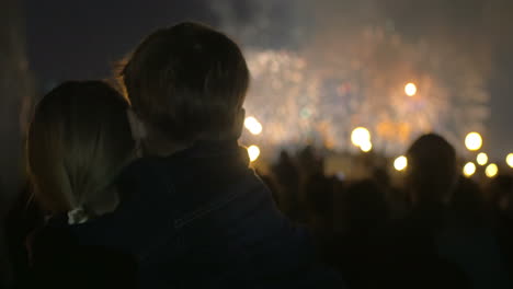 Mother-and-little-son-watching-fireworks