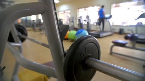 Bench-press-exerciser-in-modern-gym