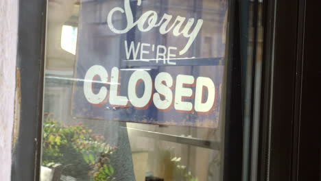 Closing-the-door-and-changing-shop-sign