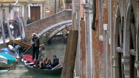 Gondolier-Diverting-a-Gondola-Boat-with-Tourists