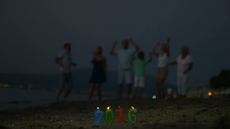 Family-party-on-the-beach-to-celebrate-New-Year-2016