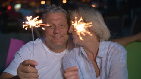 Couple-with-lit-sparklers
