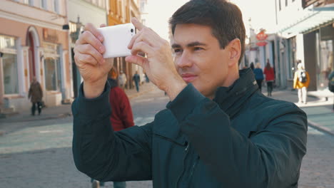 Male-Tourist-Taking-Photos-of-Tallinn-Streets