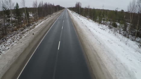 Flying-over-empty-road-in-the-north