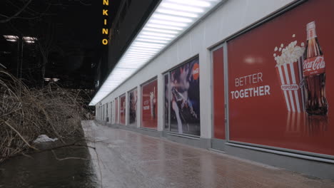 Cinema-with-Coca-Cola-and-popcorn-banners-night-view