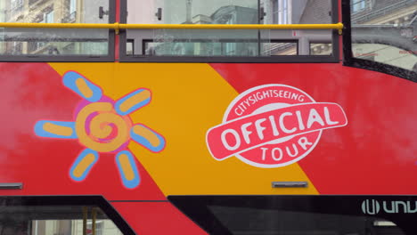 Sightseeing-double-decker-bus-passing-by-Traveling-in-Paris-France