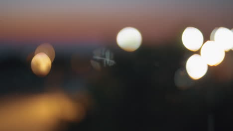 Cars-with-bright-headlights-driving-on-the-road-blur